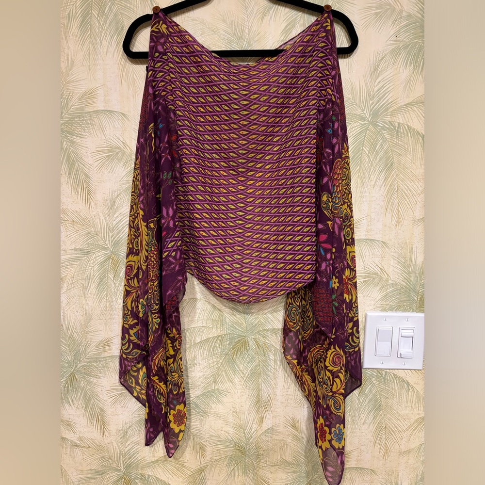 Sheer multicolor blouse. Button down bell sleeves. One-size